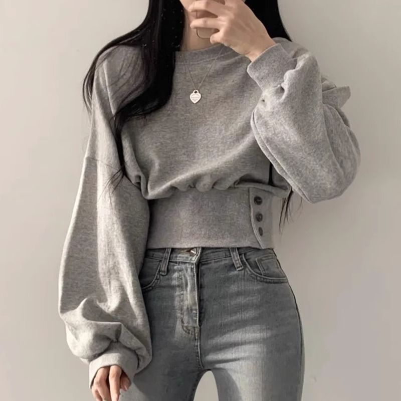 Kvinnors trendiga cropped sweatshirt med puffärmar Mirla-Eva Jonsson