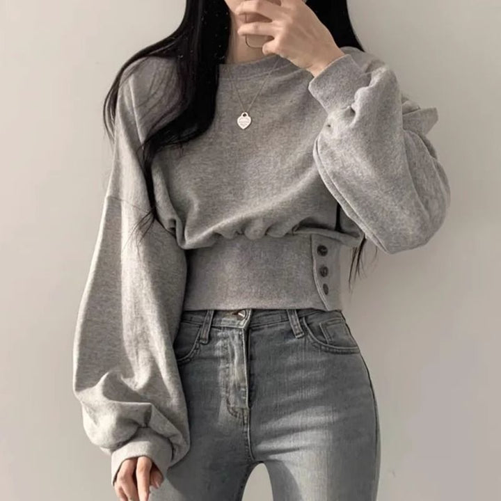 Kvinnors trendiga cropped sweatshirt med puffärmar Mirla-Eva Jonsson