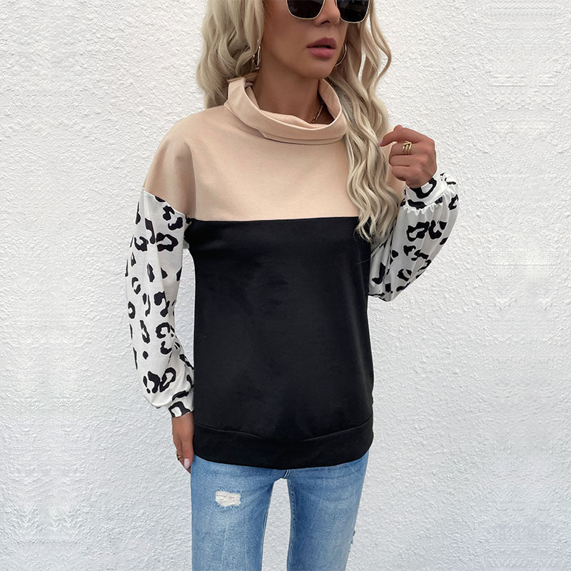 Kvinnors trendiga hoodie med djurtryck och hög krage Mirla-Eva Jonsson