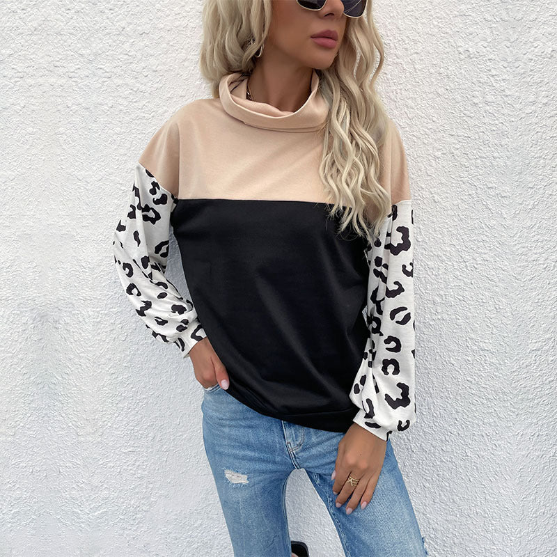 Kvinnors trendiga hoodie med djurtryck och hög krage Mirla-Eva Jonsson