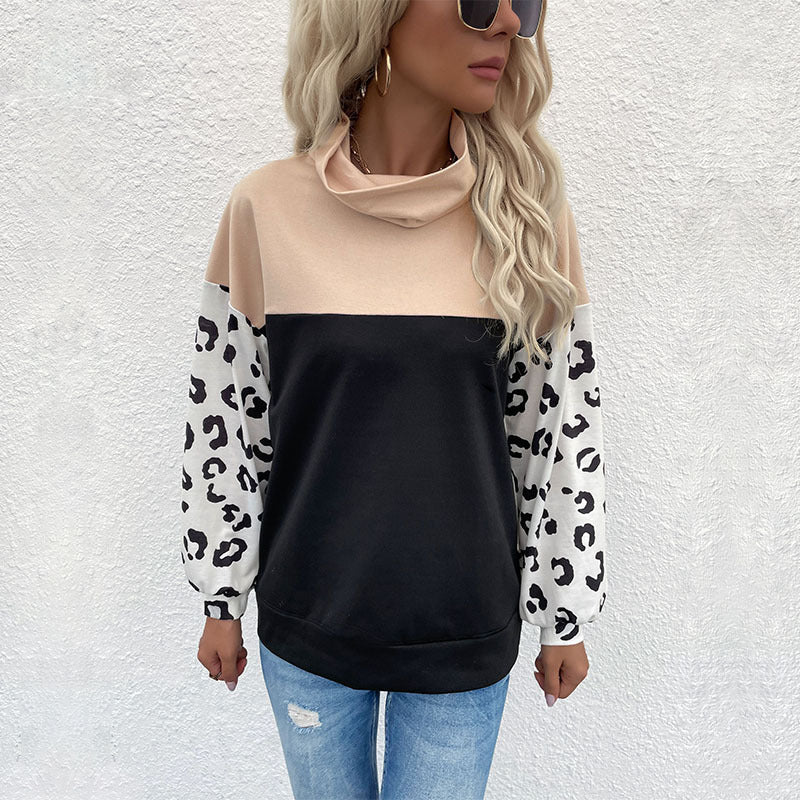 Kvinnors trendiga hoodie med djurtryck och hög krage Mirla-Eva Jonsson