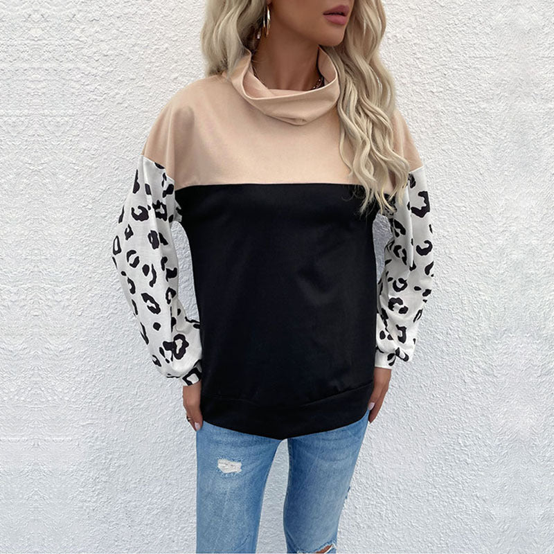 Kvinnors trendiga hoodie med djurtryck och hög krage Mirla-Eva Jonsson