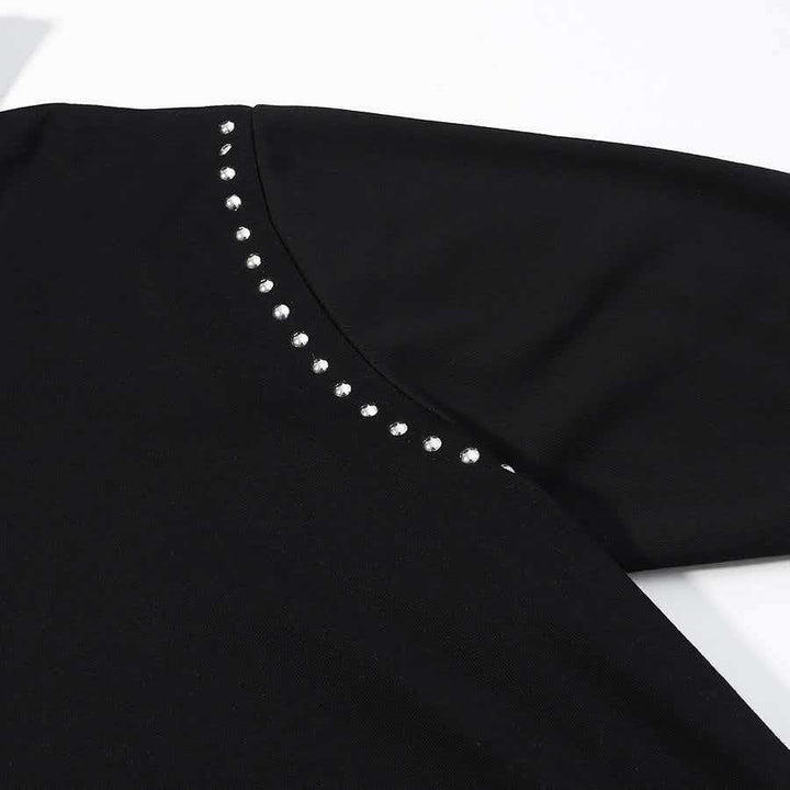 Kvinnors trendiga hoodie med eleganta nitar Mirla-Eva Jonsson