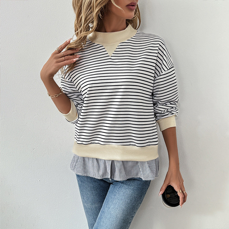 Kvinnors trendiga sweatshirt med asymmetrisk randmönster och volangdetaljer Mirla-Eva Jonsson