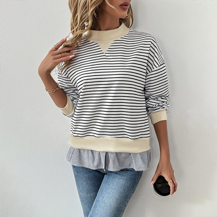 Kvinnors trendiga sweatshirt med asymmetrisk randmönster och volangdetaljer Mirla-Eva Jonsson