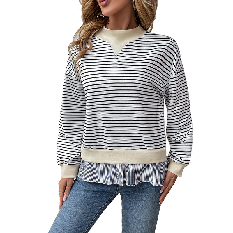 Kvinnors trendiga sweatshirt med asymmetrisk randmönster och volangdetaljer Mirla-Eva Jonsson