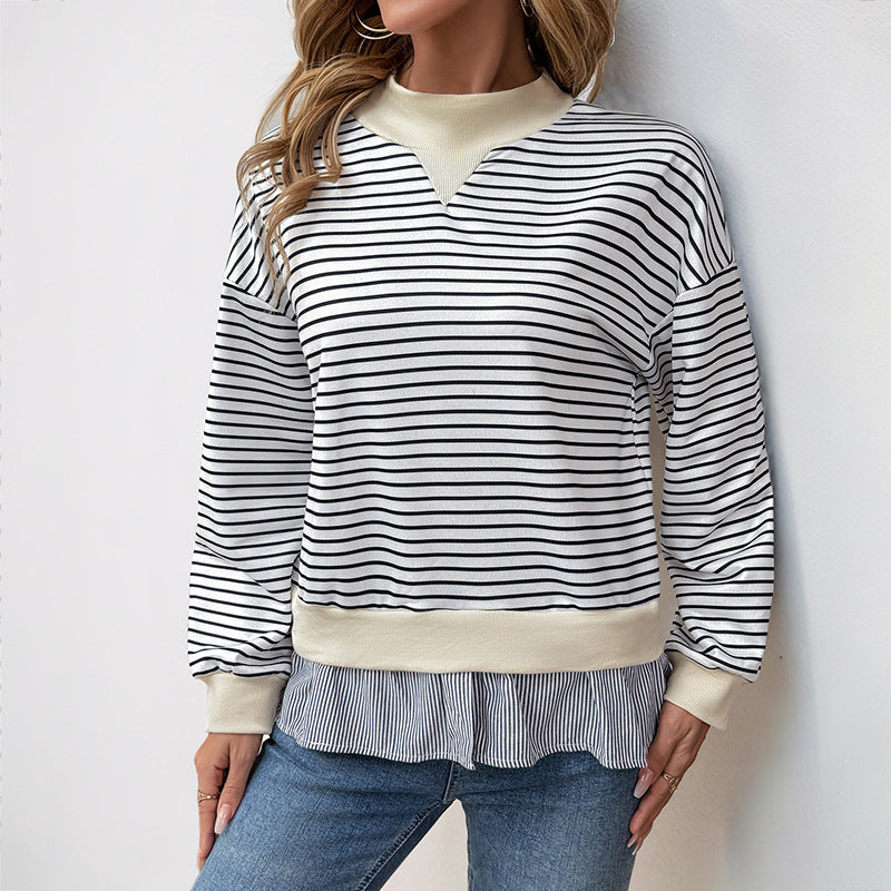 Kvinnors trendiga sweatshirt med asymmetrisk randmönster och volangdetaljer Mirla-Eva Jonsson