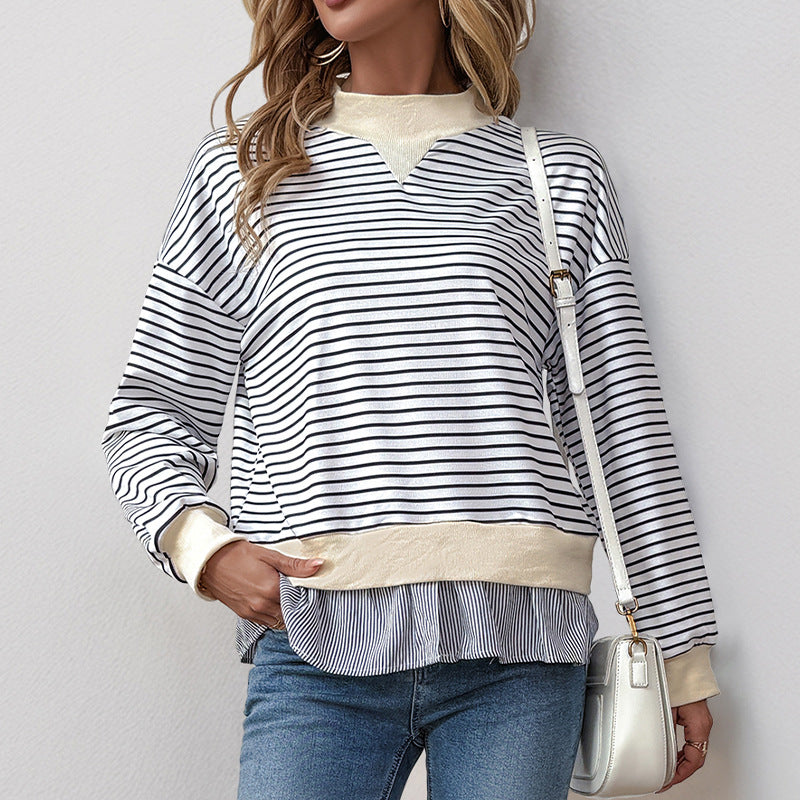 Kvinnors trendiga sweatshirt med asymmetrisk randmönster och volangdetaljer Mirla-Eva Jonsson