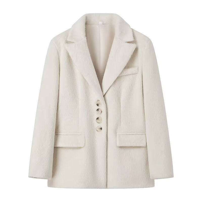 Kvinnors trendiga teddyblazer med elegant knappslå Mirla-Eva Jonsson