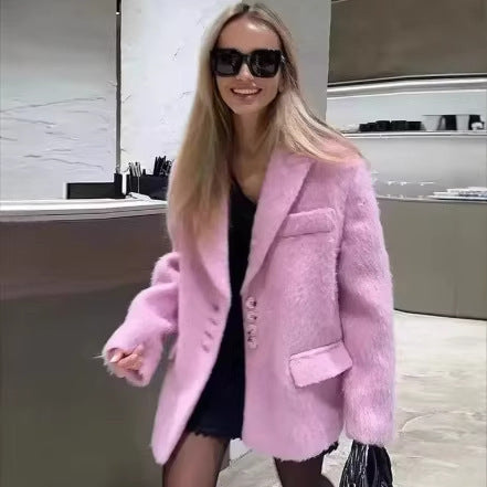 Kvinnors trendiga teddyblazer med elegant knappslå Mirla-Eva Jonsson
