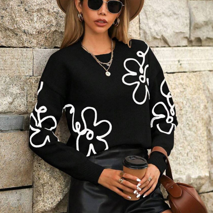 Kvinnors trendiga tröja med blommiga applikationer Mirla-Eva Jonsson