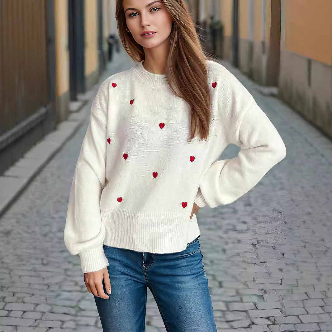 Kvinnors tröja med lekfullt hjärt-mönster och avslappnad passform Mirla-Eva Jonsson