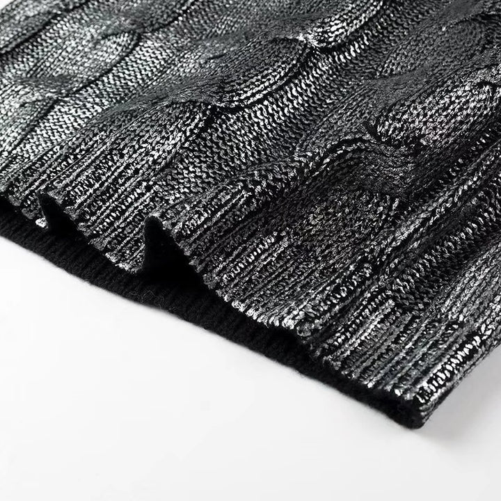 Kvinnors tröja med strukturerat kabelmönster och rundad halsringning Mirla-Eva Jonsson