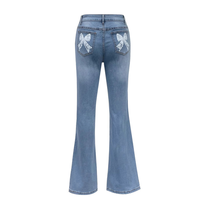 Kvinnors utsvängda jeans med dekorativa rosetter Mirla-Eva Jonsson