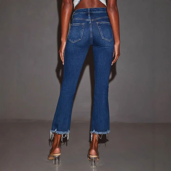 Kvinnors utsvängda jeans med trendiga förstörda detaljer och fransade kanter-Eva Jonsson