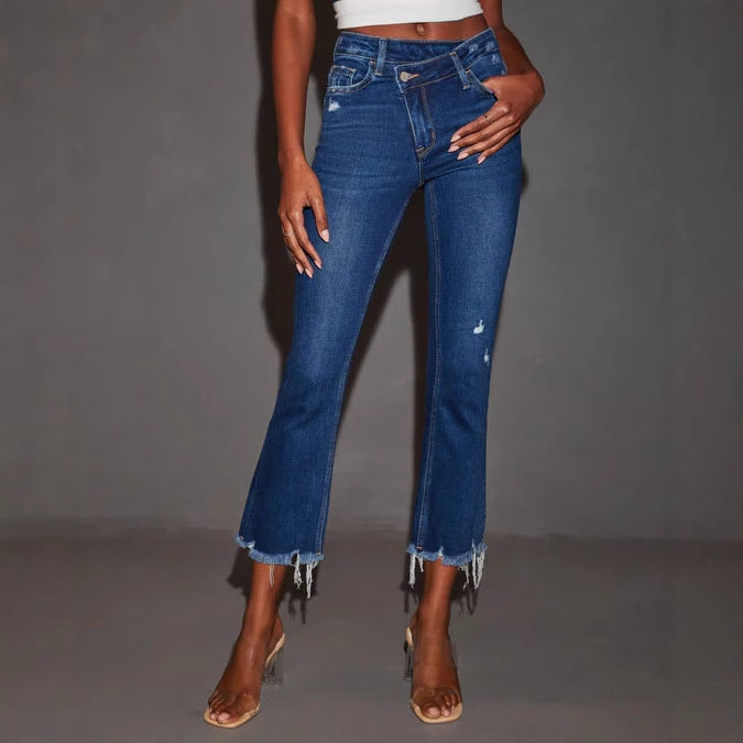 Kvinnors utsvängda jeans med trendiga förstörda detaljer och fransade kanter-Eva Jonsson
