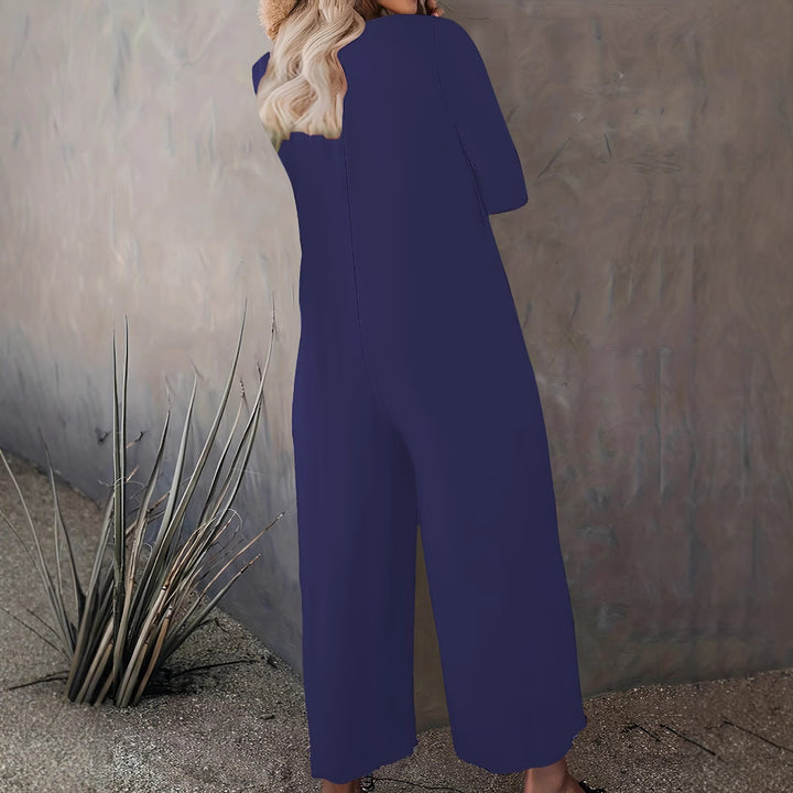 Kvinnors vid-skuren jumpsuit med praktiska fickor och modern skärning Mirla-Eva Jonsson
