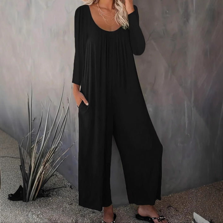 Kvinnors vid-skuren jumpsuit med praktiska fickor och modern skärning Mirla-Eva Jonsson