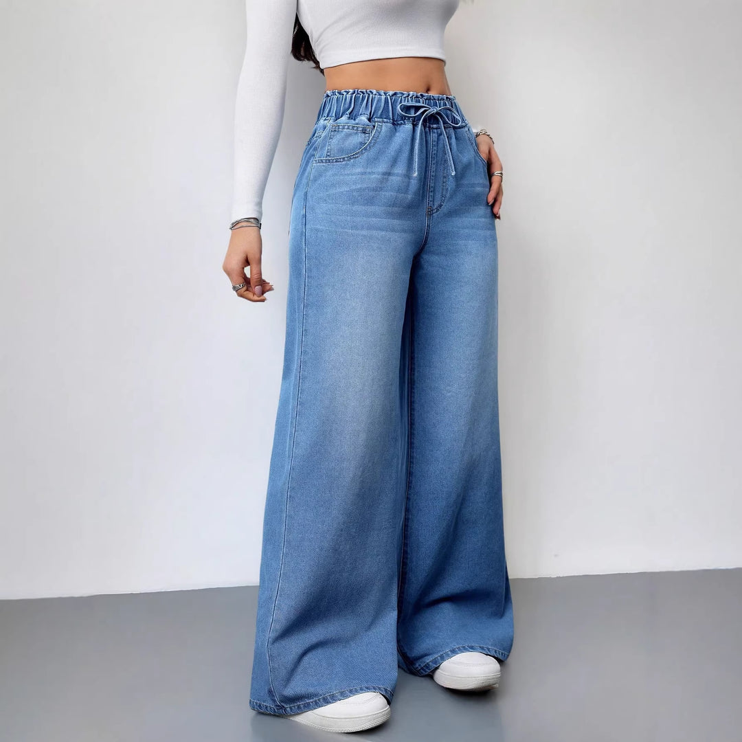 Kvinnors vida denimbyxor med elastisk midja och praktiska fickor-Eva Jonsson