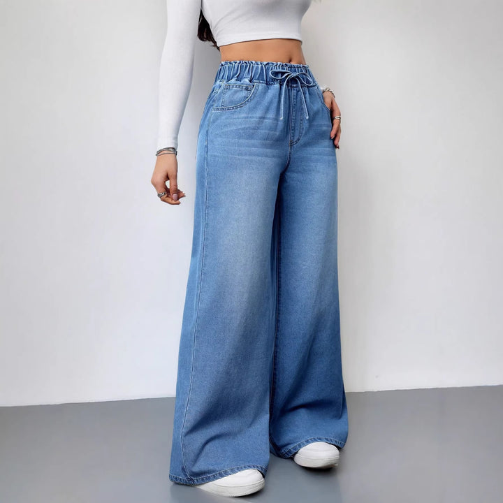 Kvinnors vida denimbyxor med elastisk midja och praktiska fickor-Eva Jonsson
