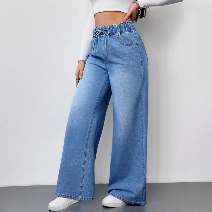 Kvinnors vida denimbyxor med elastisk midja och praktiska fickor-Eva Jonsson