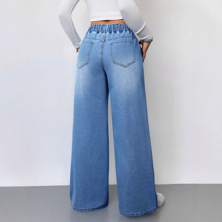 Kvinnors vida denimbyxor med elastisk midja och praktiska fickor-Eva Jonsson