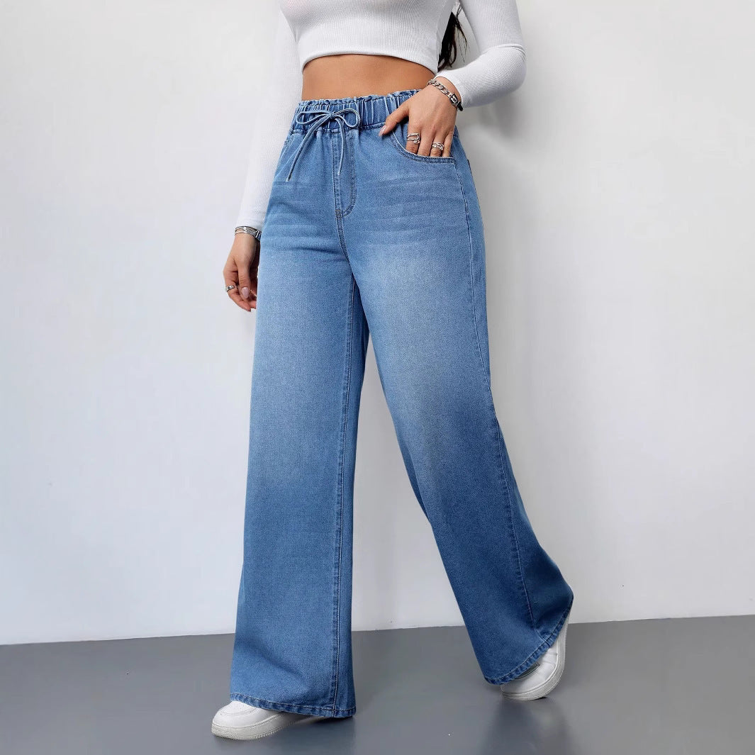 Kvinnors vida denimbyxor med elastisk midja och praktiska fickor-Eva Jonsson