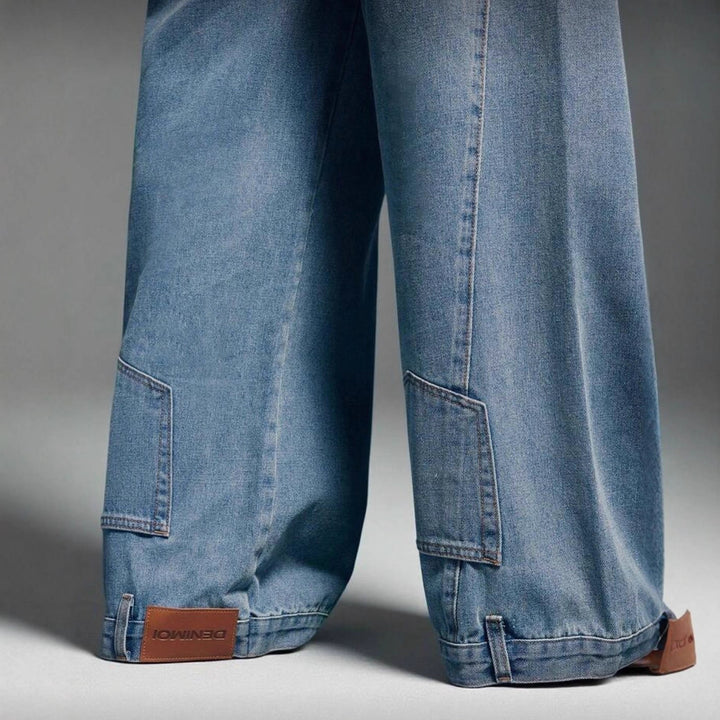 Kvinnors vida denimbyxor med hög midja och dekorativ sömnad Mirla-Eva Jonsson