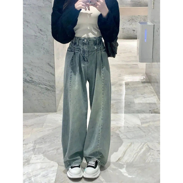 Kvinnors vida högmidjade jeans med elegant midjebandsdesign Mirla-Eva Jonsson