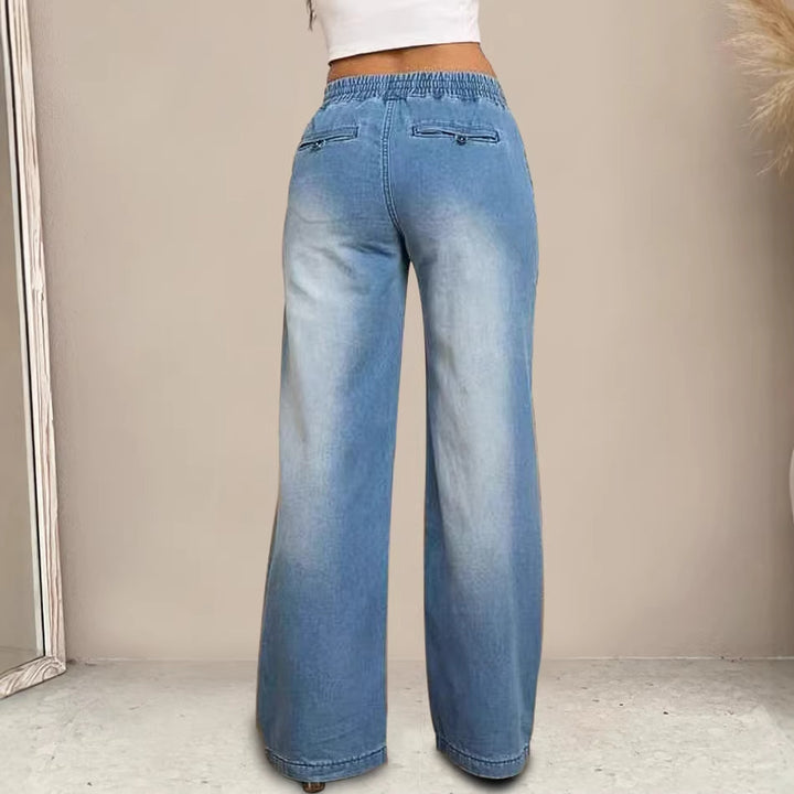 Kvinnors vida jeans med elastisk midja och trendig använd look-Eva Jonsson