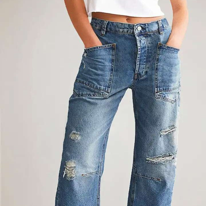 Kvinnors vida jeans med kreativa fickor och förstörda detaljer Mirla-Eva Jonsson
