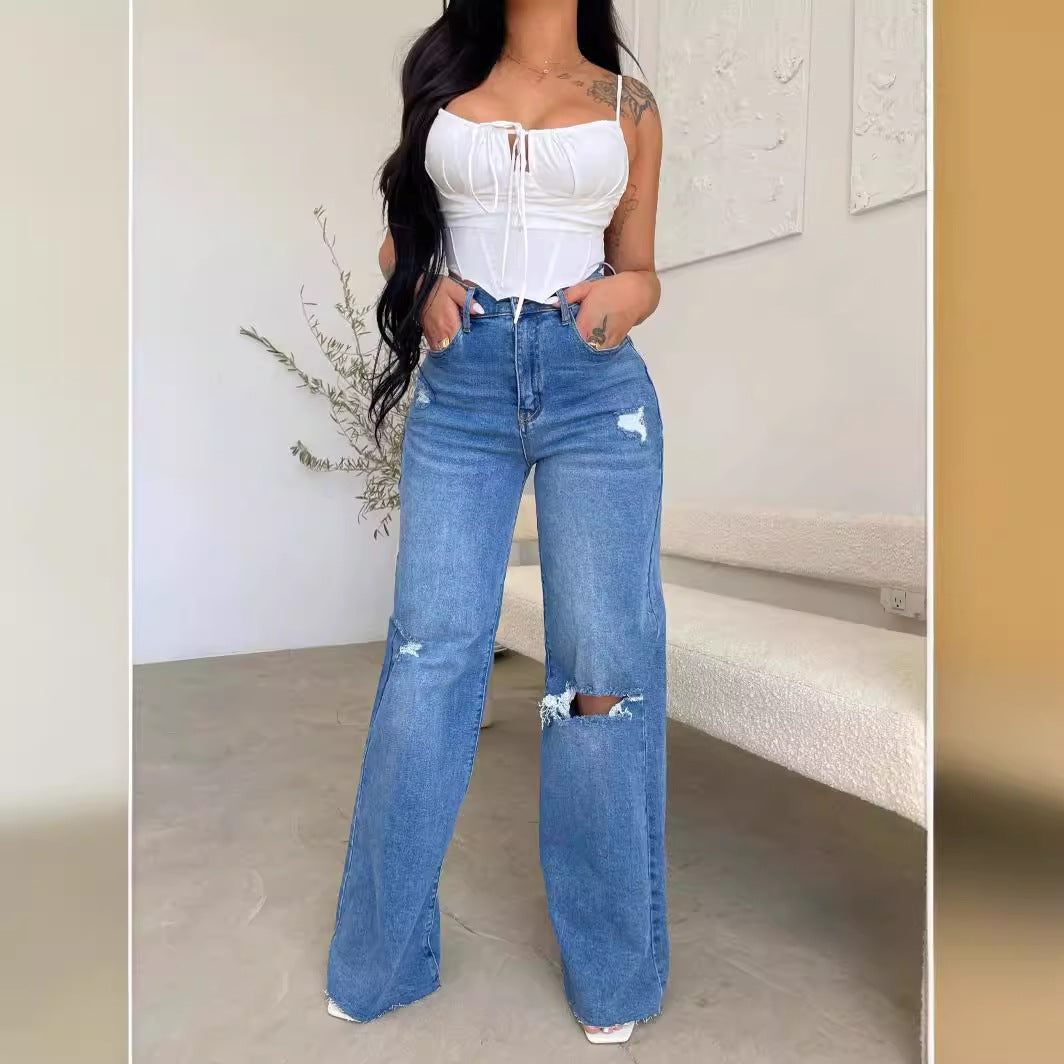 Kvinnors vida jeans med slitna detaljer och hög midja Mirla-Eva Jonsson