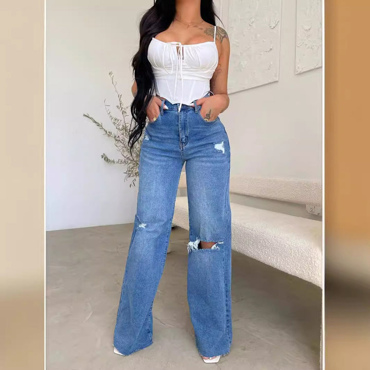 Kvinnors vida jeans med slitna detaljer och hög midja Mirla-Eva Jonsson