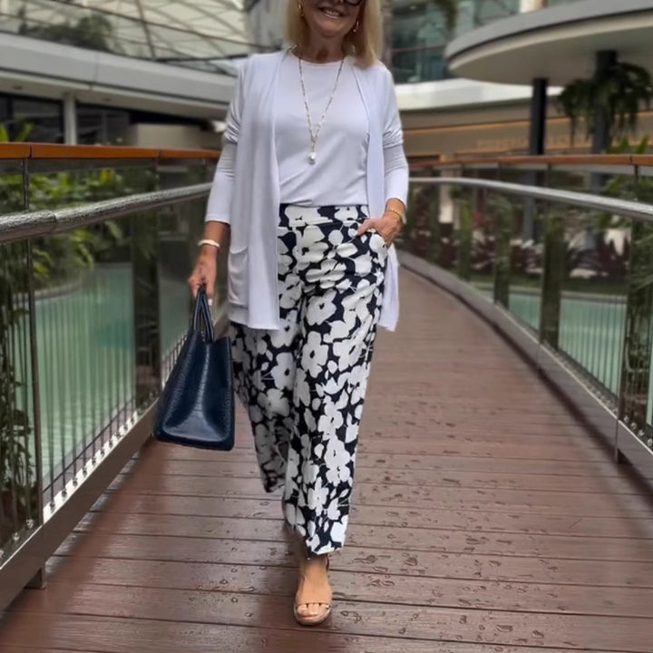 Kvinnors vida sommarbyxor med blommigt mönster och elastisk midja Mirla-Eva Jonsson