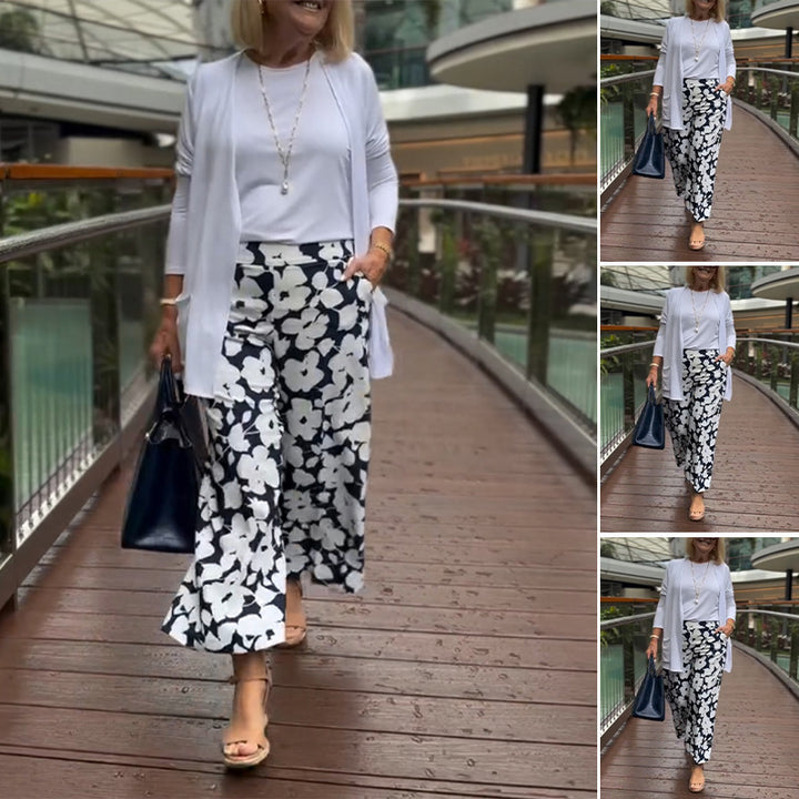 Kvinnors vida sommarbyxor med blommigt mönster och elastisk midja Mirla-Eva Jonsson
