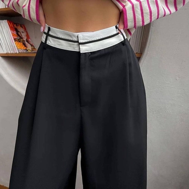 Kvinnors vida tygbyxor med elastisk midja och kontrasterande bälte Mirla-Eva Jonsson