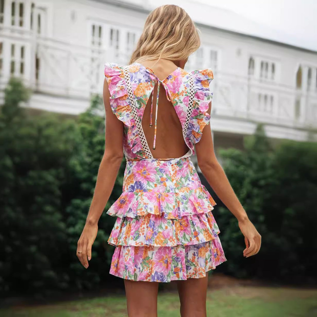 Kvinnors volang sommarklänning med blommönster och chic midjebälte Mirla-Eva Jonsson