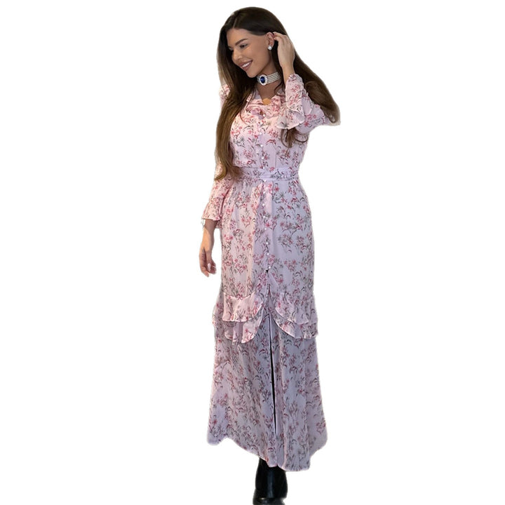 Kvinnors volangklänning med blommönster och elegant V-ringning-Eva Jonsson