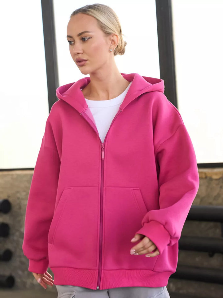Kvinnors zip hoodie med en avslappnad passform och stora fickor Mirla-Eva Jonsson