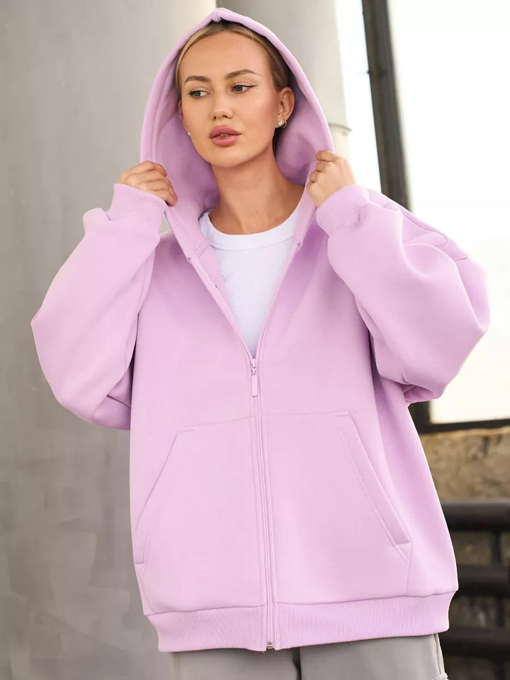 Kvinnors zip-hoodie med en avslappnad skärning och stora fickor Mirla-Eva Jonsson