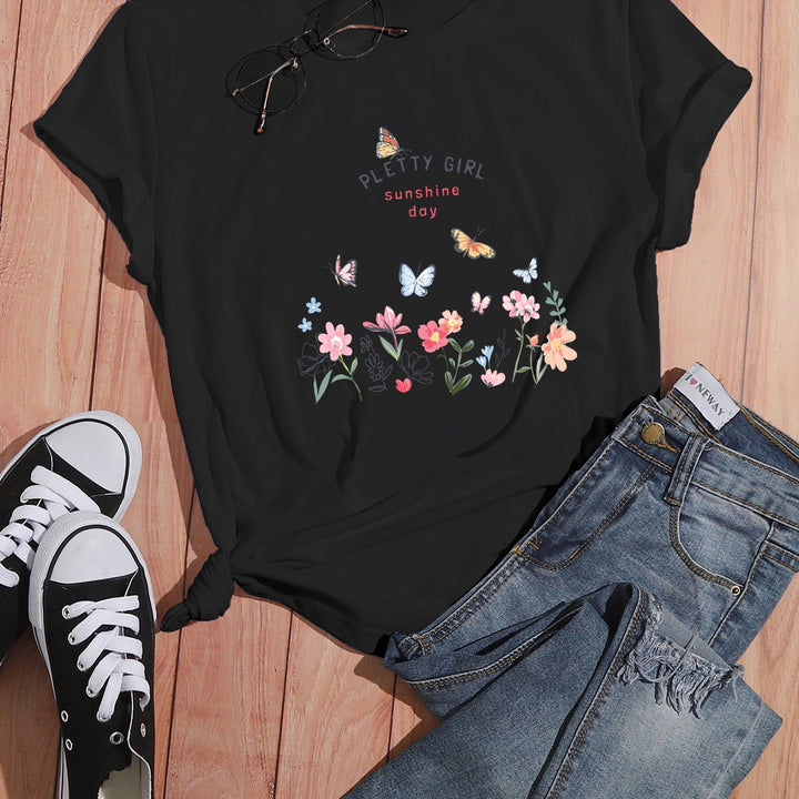 Kvinnot-shirt med lekfullt blommönster och elegant tryck Mirla-Eva Jonsson