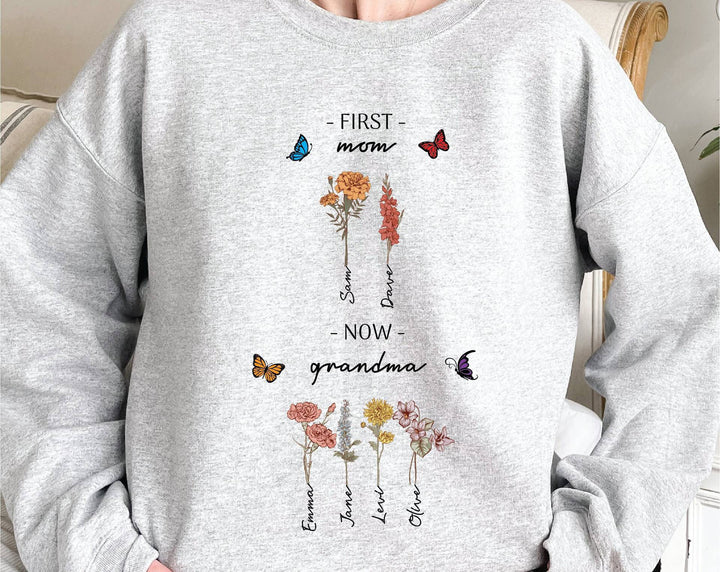 Kvinnotröja med blommig tryck och inspirerande text Mirla-Eva Jonsson