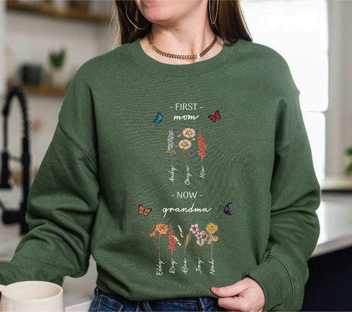 Kvinnotröja med blommig tryck och inspirerande text Mirla-Eva Jonsson