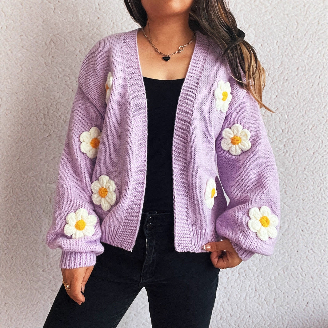 Kvinnotröja med blommönsterapplikationer Mirla-Eva Jonsson