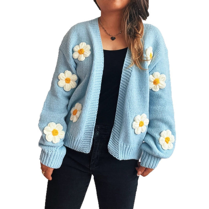 Kvinnotröja med blommönsterapplikationer Mirla-Eva Jonsson