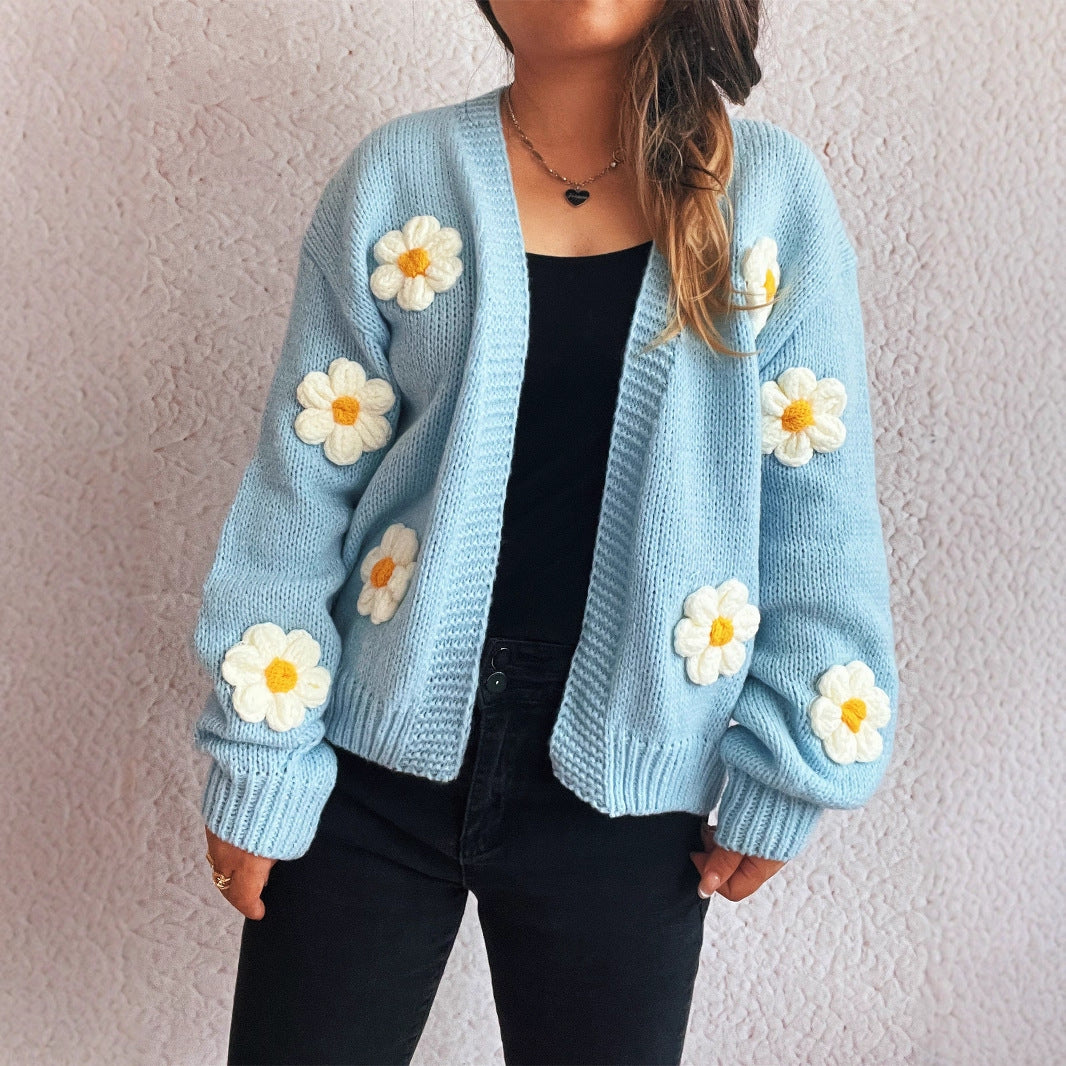 Kvinnotröja med blommönsterapplikationer Mirla-Eva Jonsson