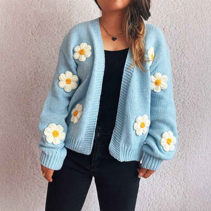 Kvinnotröja med blommönsterapplikationer Mirla-Eva Jonsson