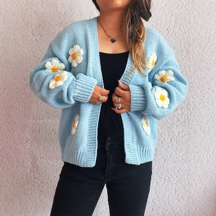 Kvinnotröja med blommönsterapplikationer Mirla-Eva Jonsson