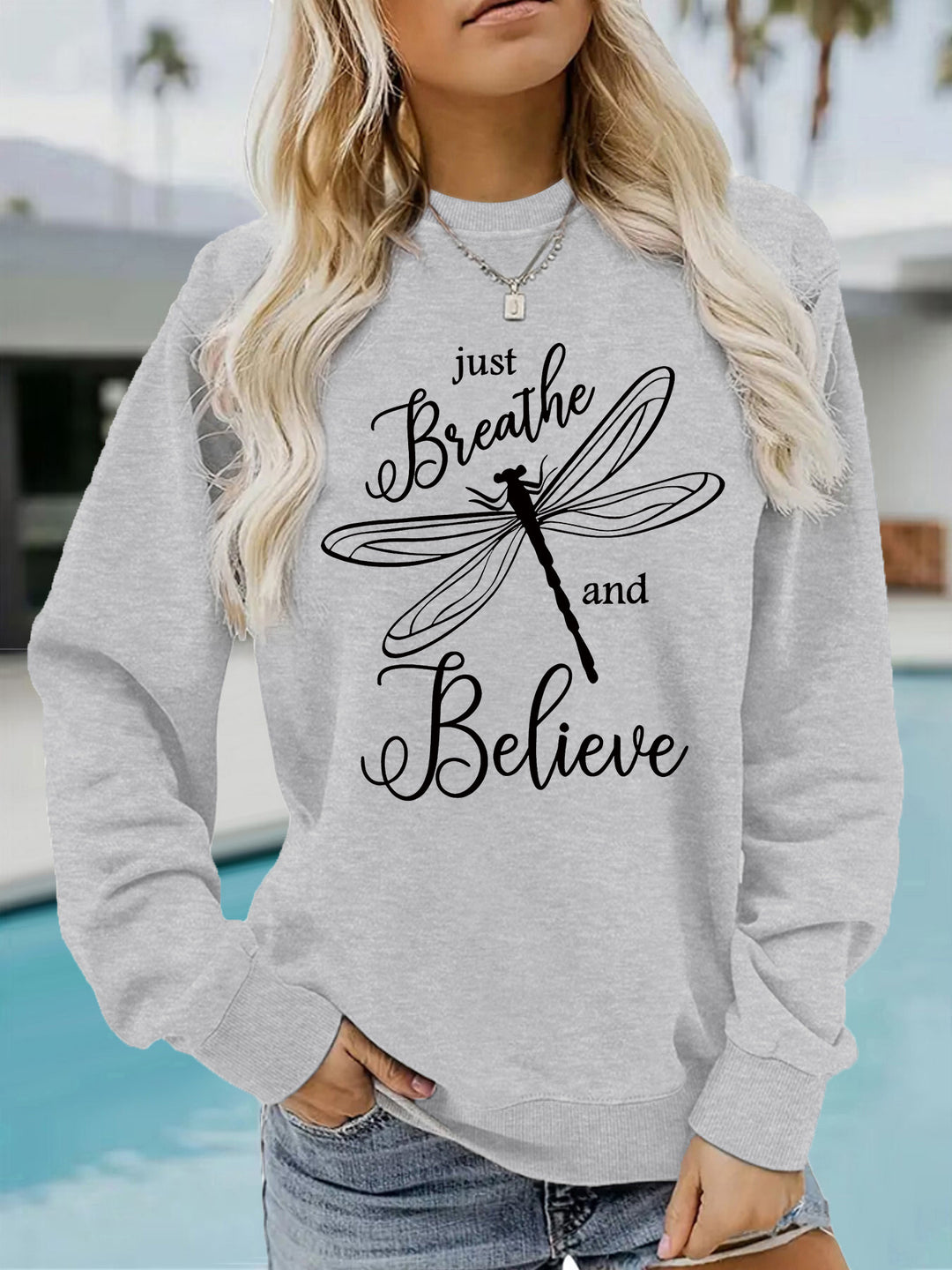 Kvinnotröja med inspirerande drakflygning motiv och avslappnad passform Mirla-Eva Jonsson