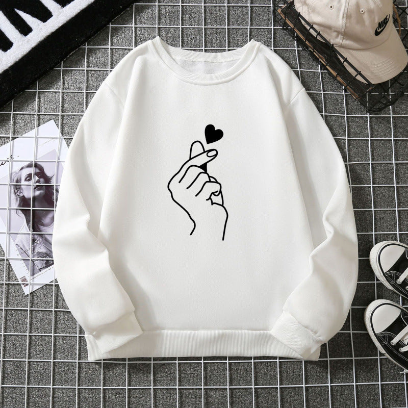 Kvinnotröja med kreativ handsymbolmotiv och mjukt innertyg Mirla-Eva Jonsson